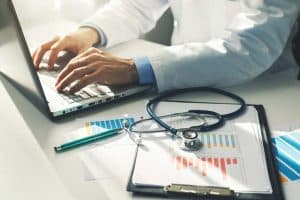 addiction specialist reviewing masschusetts drug rehab success rates and statistics