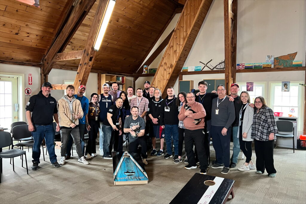 Swift River alumni enjoying the cornhole tournament