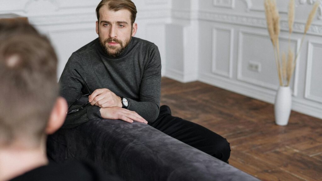 photo of a man in therapy, contact swift river for help getting DBT for addiction.