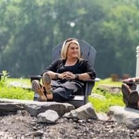 adult woman sitting outside